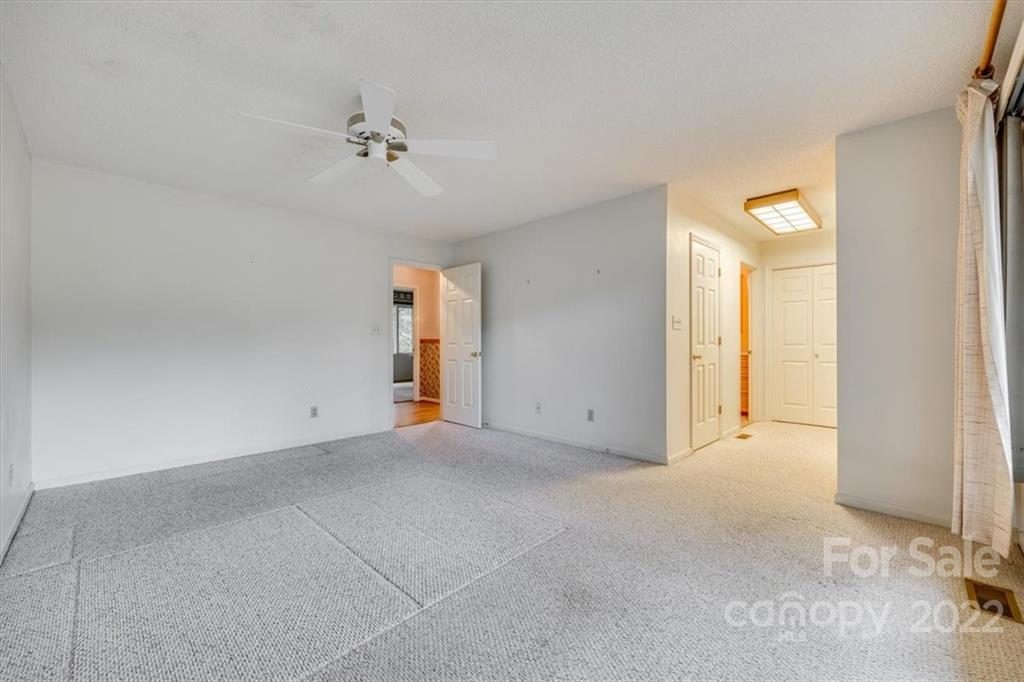 6036 Agate Court Tega Cay, SC 29708 - Photo 15 of 44 a view of an empty room with a window