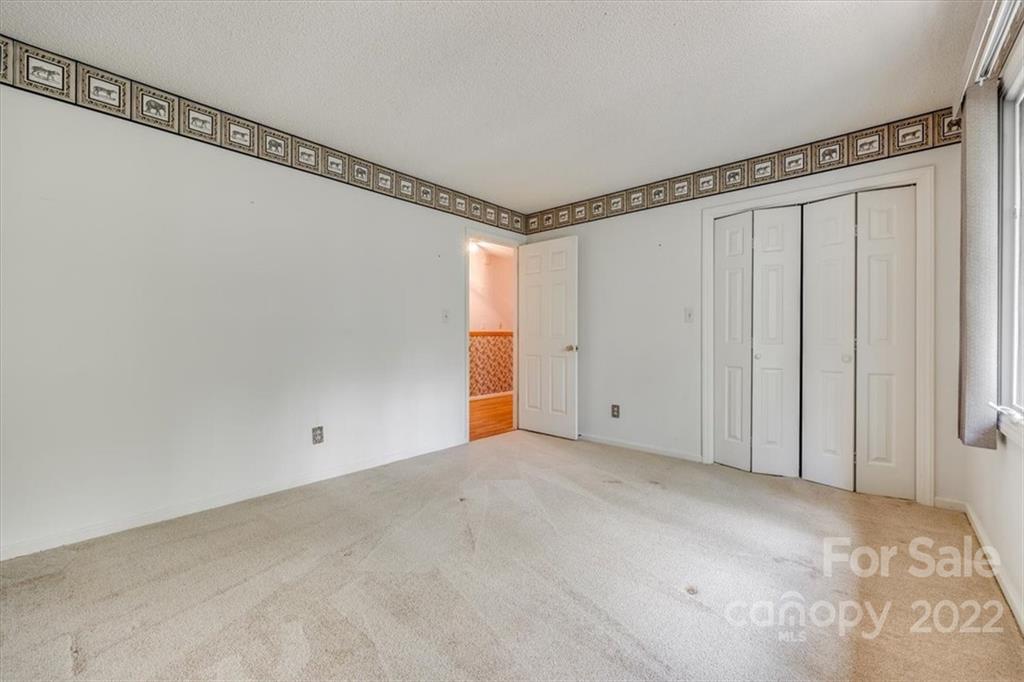6036 Agate Court Tega Cay, SC 29708 - Photo 20 of 44 a view of a room with an empty space