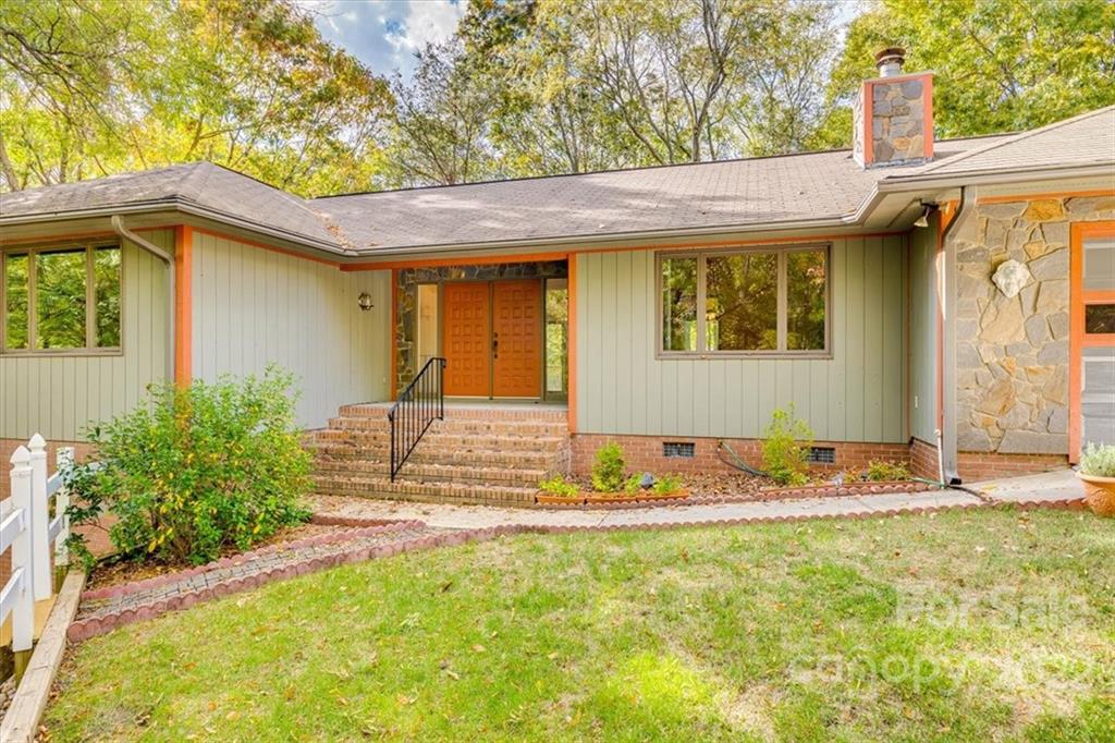 6036 Agate Court Tega Cay, SC 29708 - Photo 2 of 44 a front view of house with an outdoor space