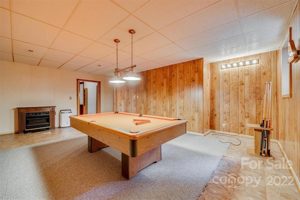 6036 Agate Court Tega Cay, SC 29708 - Photo 29 of 44 a room with pool table and flat screen tv