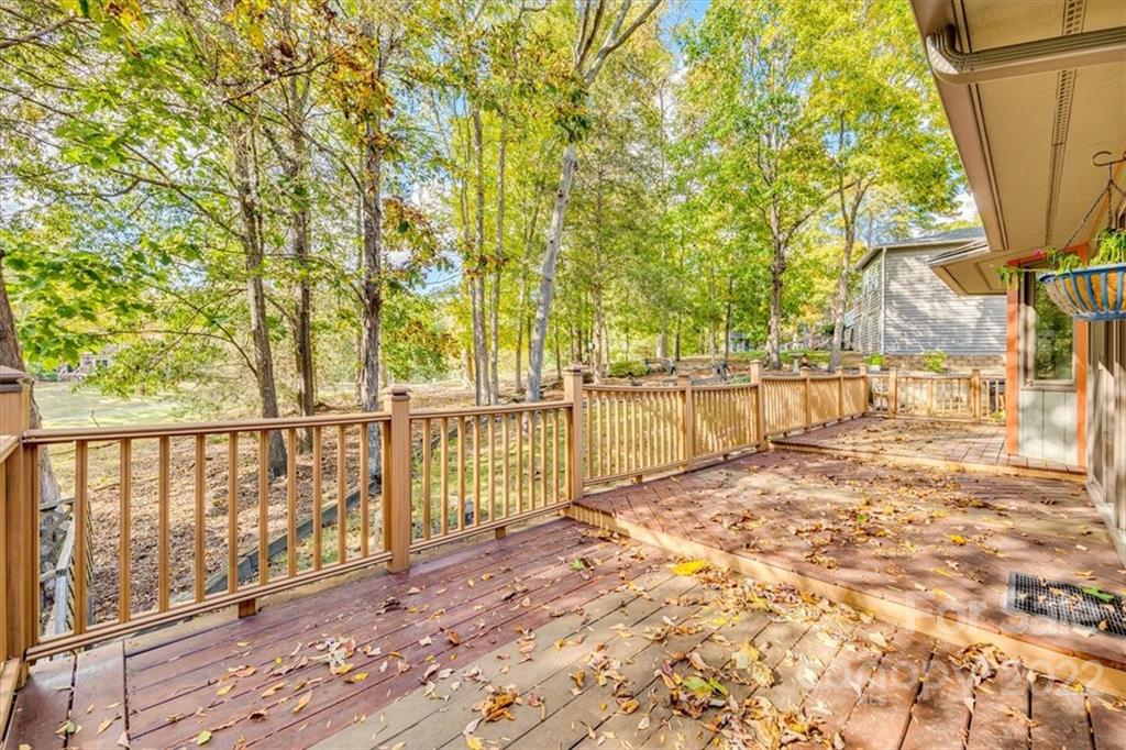 6036 Agate Court Tega Cay, SC 29708 - Photo 35 of 44 a view of backyard with wooden fence
