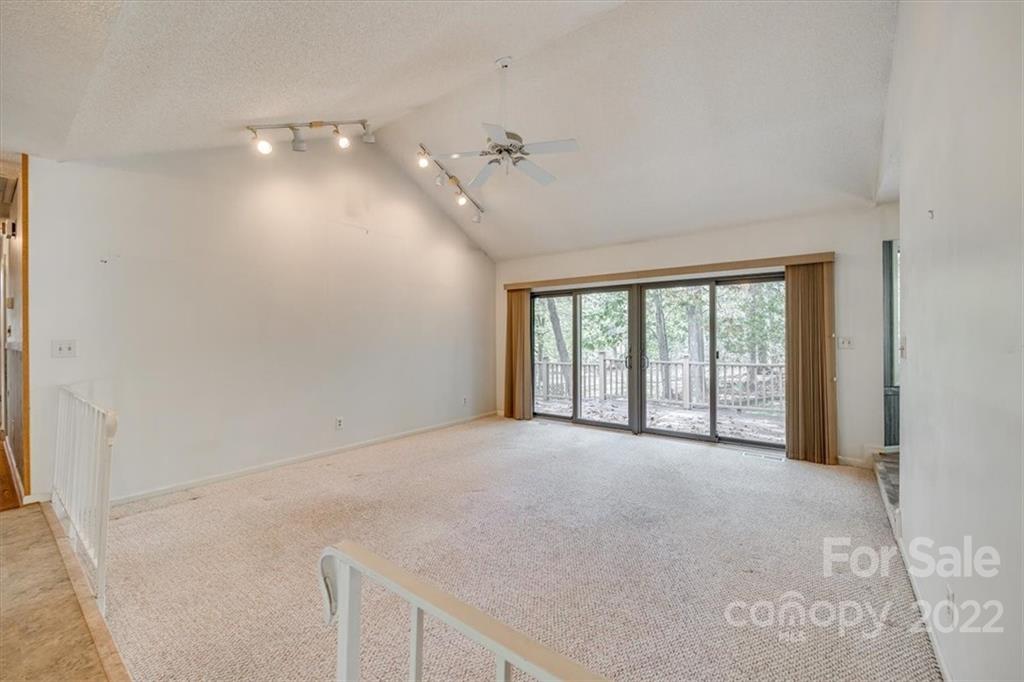6036 Agate Court Tega Cay, SC 29708 - Photo 4 of 44 a view of an empty room with a window