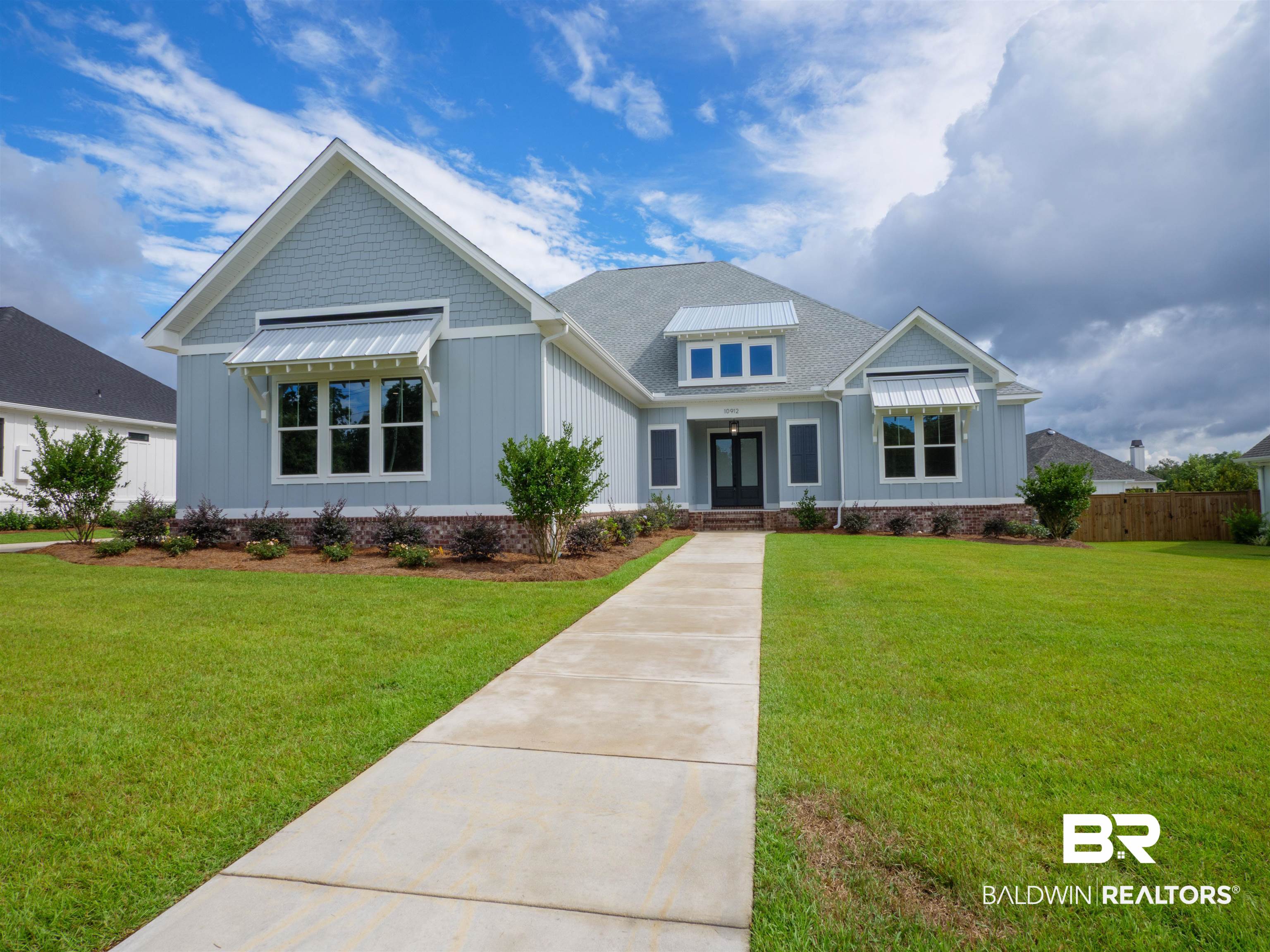 10912 Catania Avenue Fairhope, AL 36532 - Photo 2 of 54 Landscaped front lawn with walkway to the entry