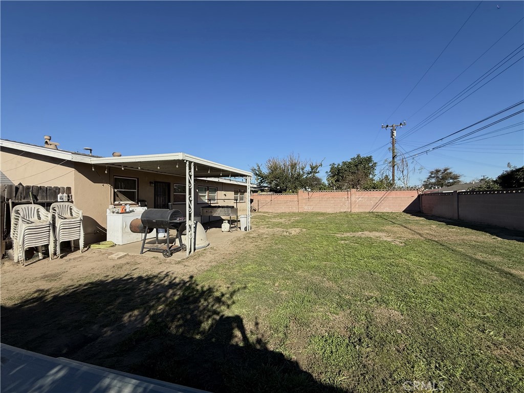 2309 Spinnaker Street Santa Ana, CA 92706 - Photo 8 of 9 a view of a house with backyard and sitting area