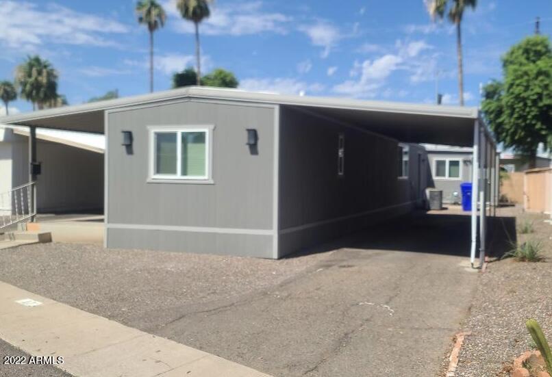 5201 West Camelback Road, Unit A7 Phoenix, AZ 85031 - Photo 3 of 22 a house with a outdoor space