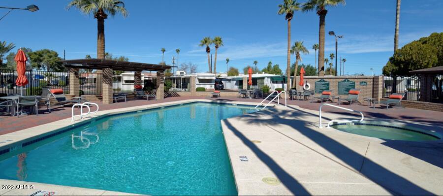 5201 West Camelback Road, Unit A7 Phoenix, AZ 85031 - Photo 7 of 22 a view of a lake with a sitting area