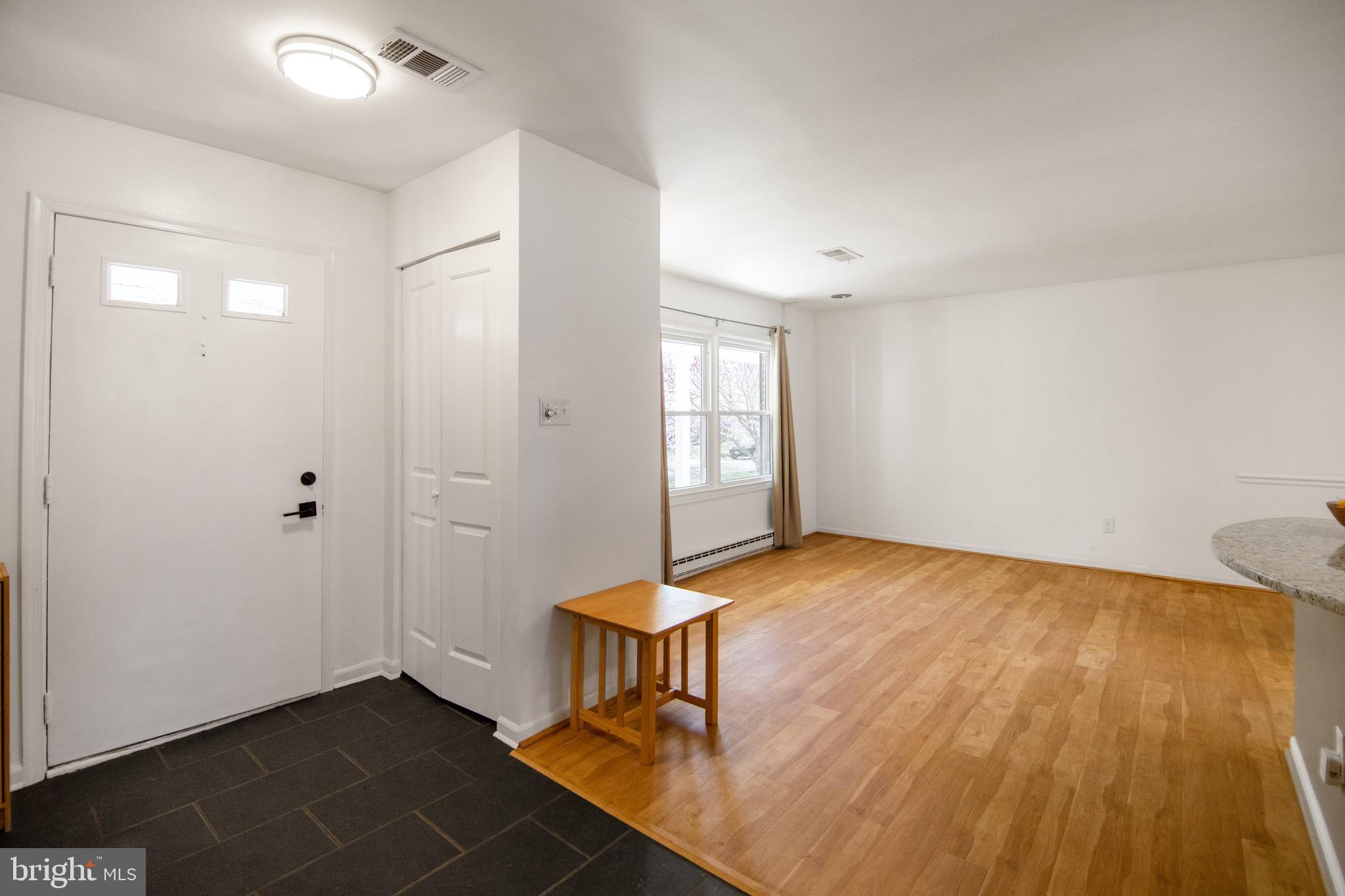 11324 Rambling Road Gaithersburg, MD 20879 - Photo 2 of 29 Foyer opens into living room