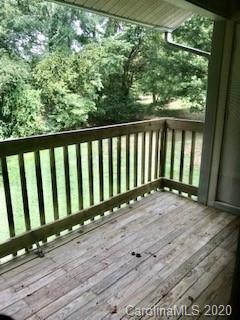 11048 Harrowfield Road Charlotte, NC 28226 - Photo 13 of 13 a view of balcony with wooden floor