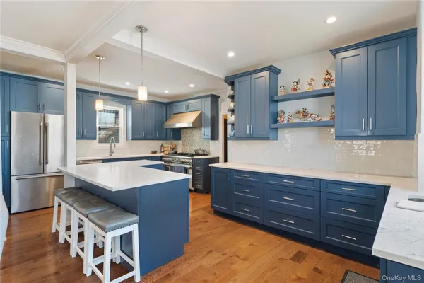 a kitchen with wooden cabinets and a sink