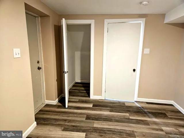 a view of entryway with wooden floor