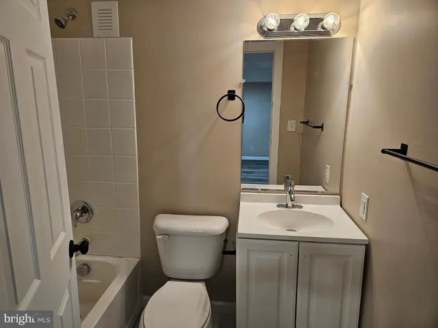 a bathroom with a bathtub