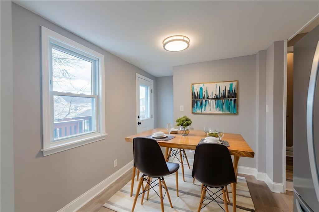 519 Lacock Street Rochester, PA 15074 - Photo 16 of 39 a dining room with furniture and a window