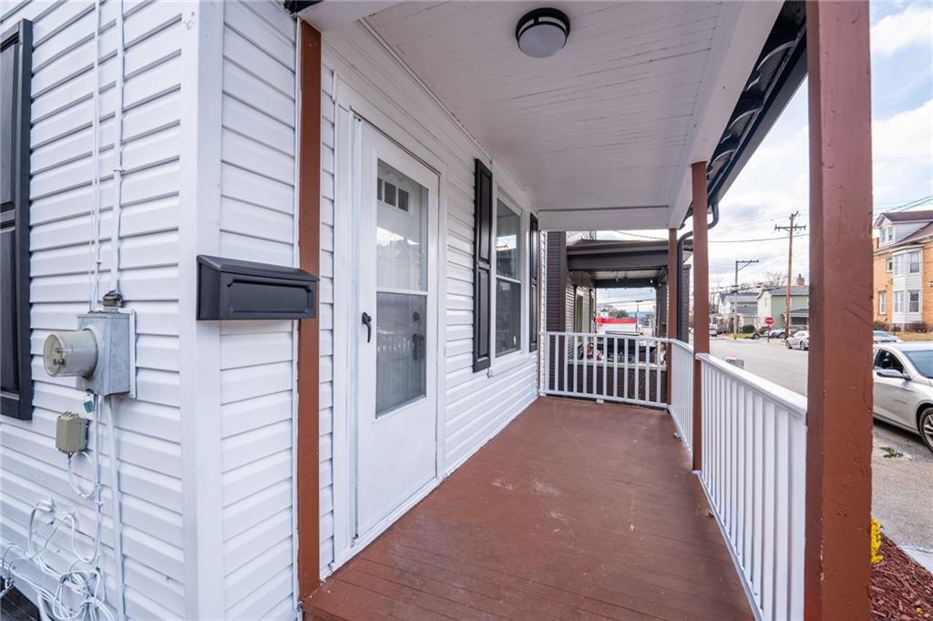 519 Lacock Street Rochester, PA 15074 - Photo 2 of 39 a view of a porch with wooden floor