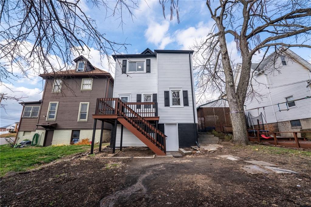 519 Lacock Street Rochester, PA 15074 - Photo 37 of 39 a front view of a house with a yard