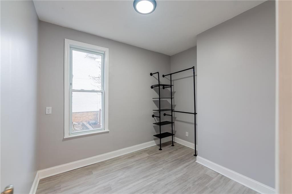 519 Lacock Street Rochester, PA 15074 - Photo 10 of 39 an empty room with windows and closet