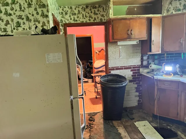 a bathroom with a toilet and a sink