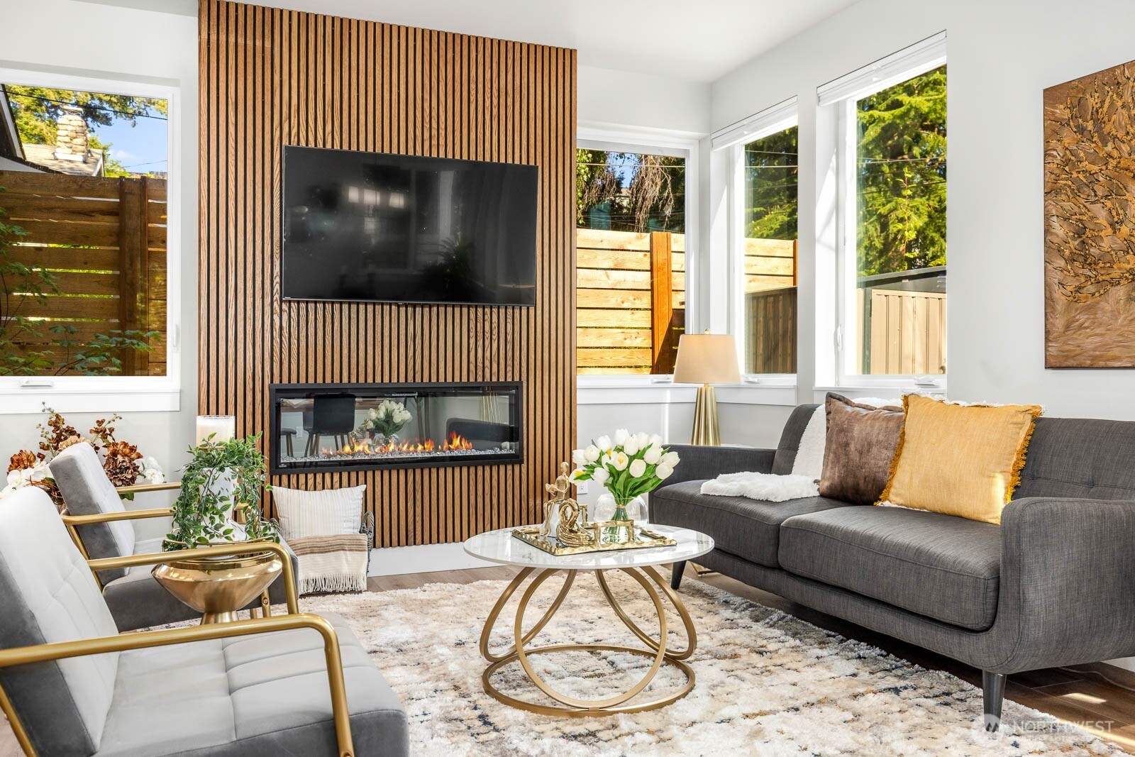 4326 Southwest Mills Street Seattle, WA 98136 - Photo 6 of 37 a living room with furniture and a flat screen tv