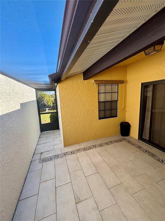 13100 South McCall Road, Unit 111 Port Charlotte, FL 33981 - Photo 7 of 10 a view of an empty room with a window