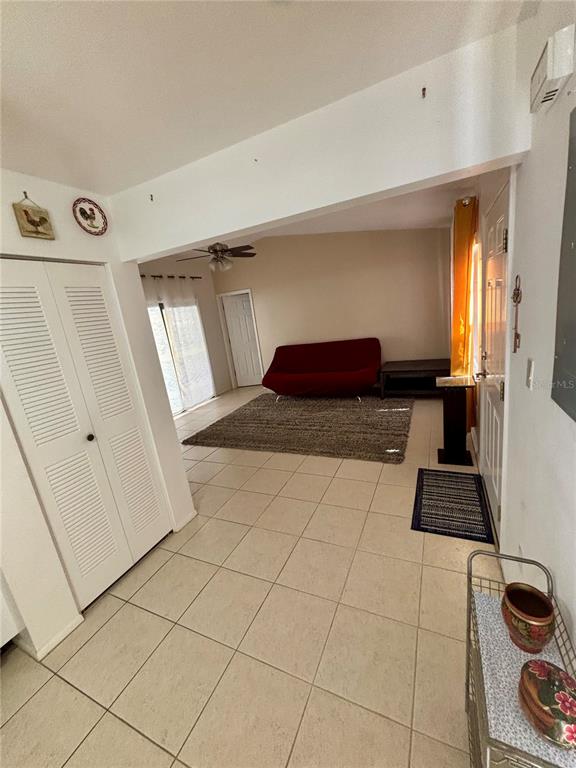 13100 South McCall Road, Unit 111 Port Charlotte, FL 33981 - Photo 9 of 10 a bedroom with a bed and a window