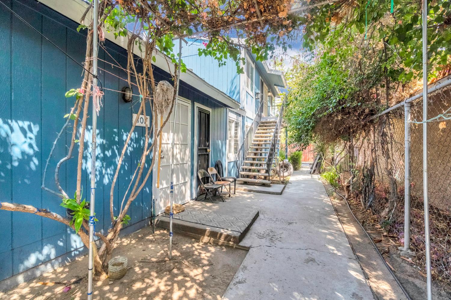 1622 B Street Fresno, CA 93706 - Photo 5 of 32 a backyard of a house with outdoor seating