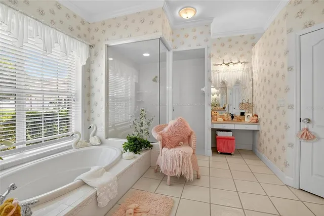 a bathroom with a bathtub shower and a sink