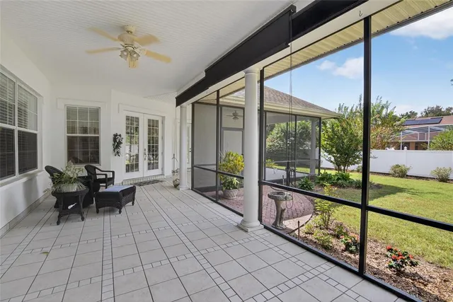 a balcony with chairs