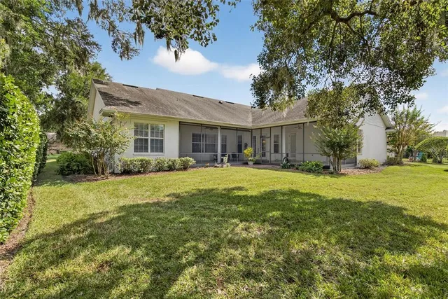 a house with trees in front of it
