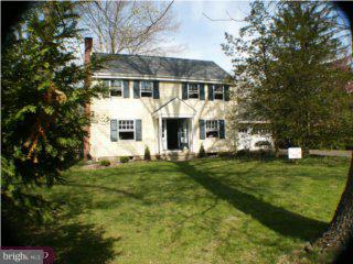 60 Laurel Road Princeton, NJ 08540 - Photo 1 of 6 a front view of a house with a garden