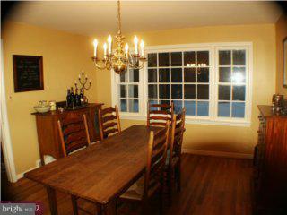 60 Laurel Road Princeton, NJ 08540 - Photo 2 of 6 a view of a dining room with furniture and chandelier