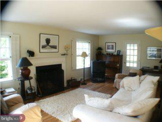 60 Laurel Road Princeton, NJ 08540 - Photo 3 of 6 a living room with furniture and a fireplace