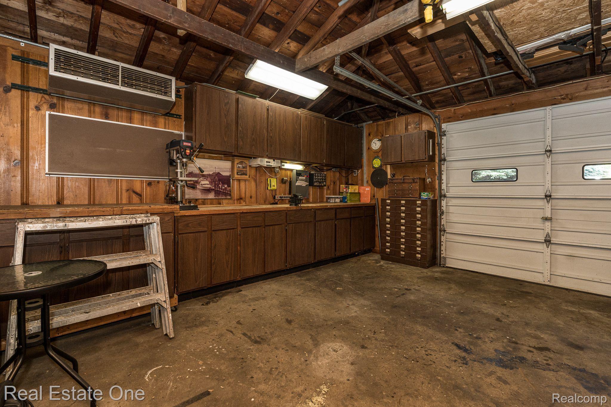 1121 Princeton Avenue Rochester, MI 48307 - Photo 42 of 48 1.5 Car Garage with Workbench