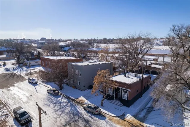 a view of a terrace with chairs and a fire pit