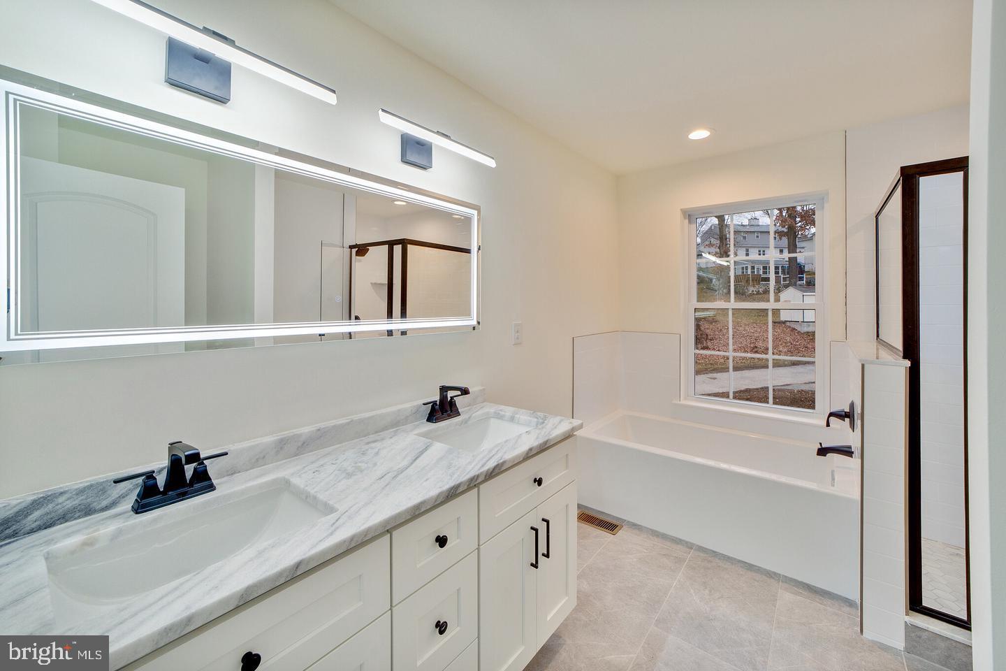 274 Oak Avenue Media, PA 19063 - Photo 18 of 27 a bathroom with a granite countertop sink mirror toilet and bathtub