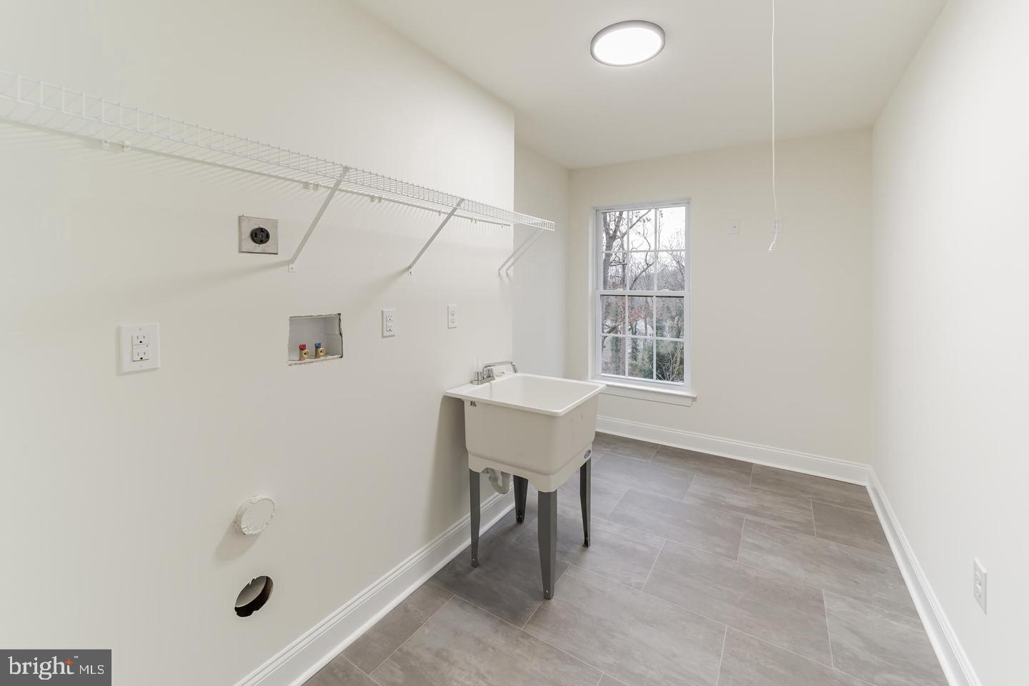 274 Oak Avenue Media, PA 19063 - Photo 20 of 27 a bathroom with a window sink and chair