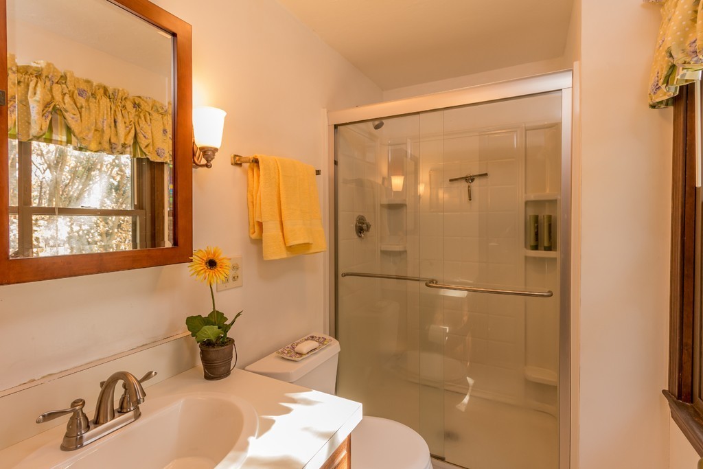 23 Country Road Lunenburg, MA 01462 - Photo 15 of 21 a bathroom with a sink and a shower