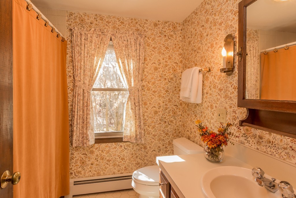23 Country Road Lunenburg, MA 01462 - Photo 17 of 21 a bathroom with a sink toilet and shower