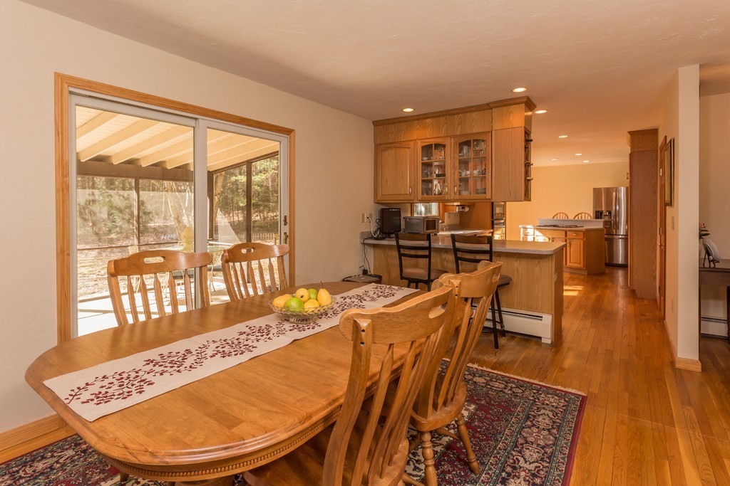 23 Country Road Lunenburg, MA 01462 - Photo 4 of 21 a view of a dining room with furniture window and wooden floor