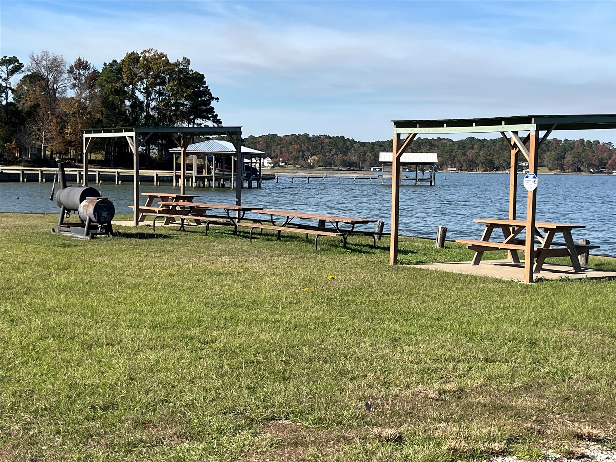 a view of a swimming pool with lawn chairs