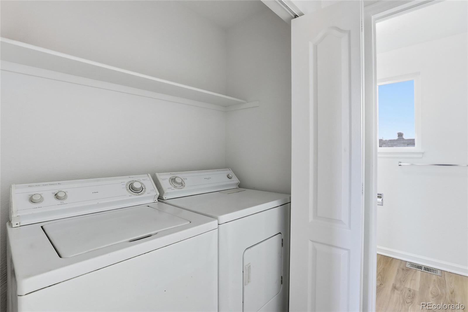 3736 South Inca Street Englewood, CO 80110 - Photo 12 of 31 a utility room with dryer and washer
