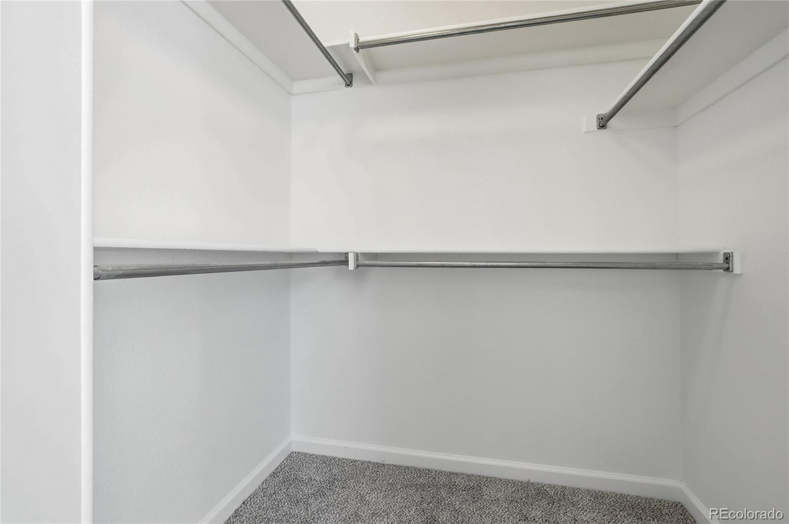 3736 South Inca Street Englewood, CO 80110 - Photo 17 of 31 a view of a room with racks on the wall