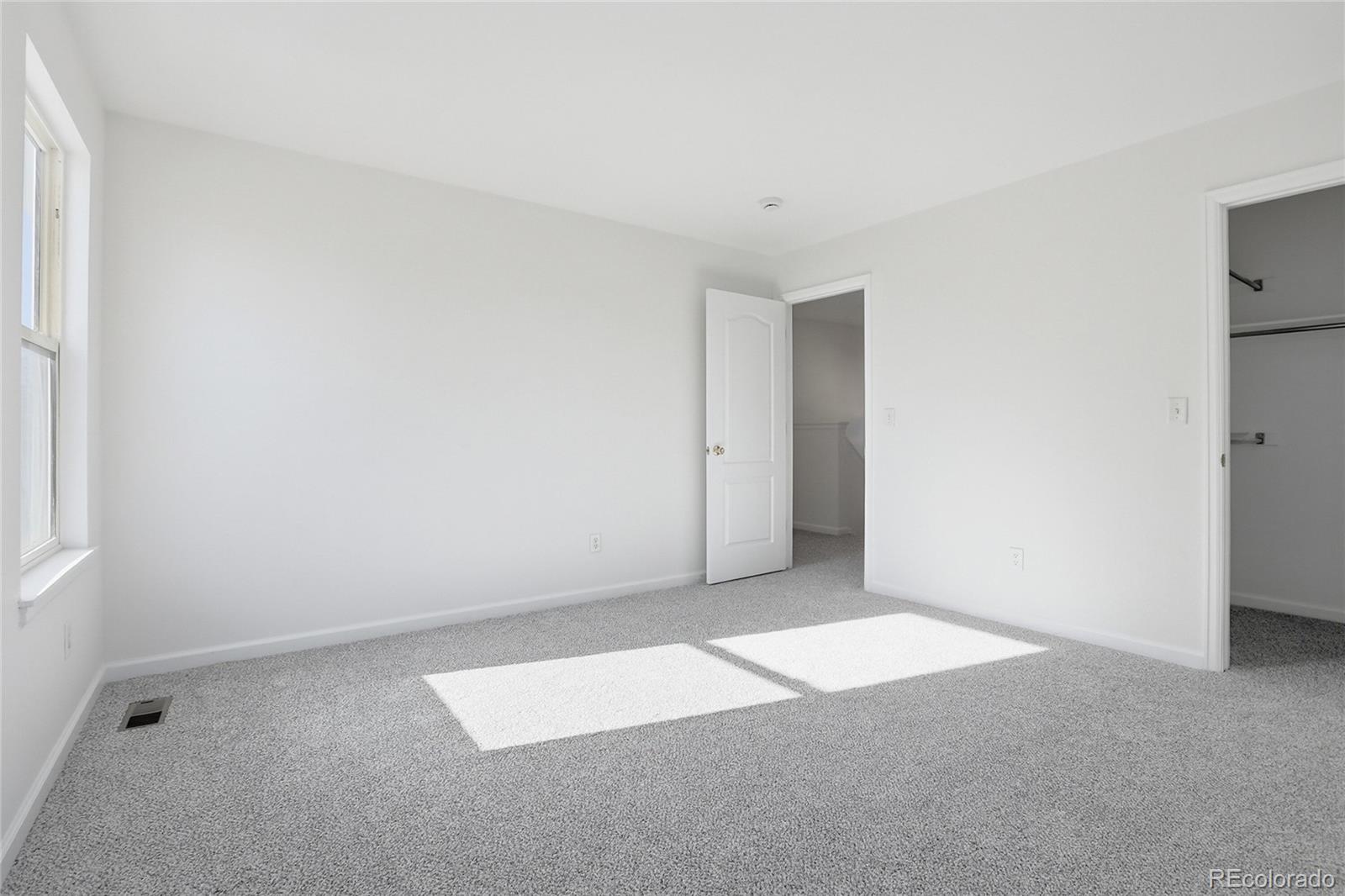 3736 South Inca Street Englewood, CO 80110 - Photo 21 of 31 an empty room with an entryway