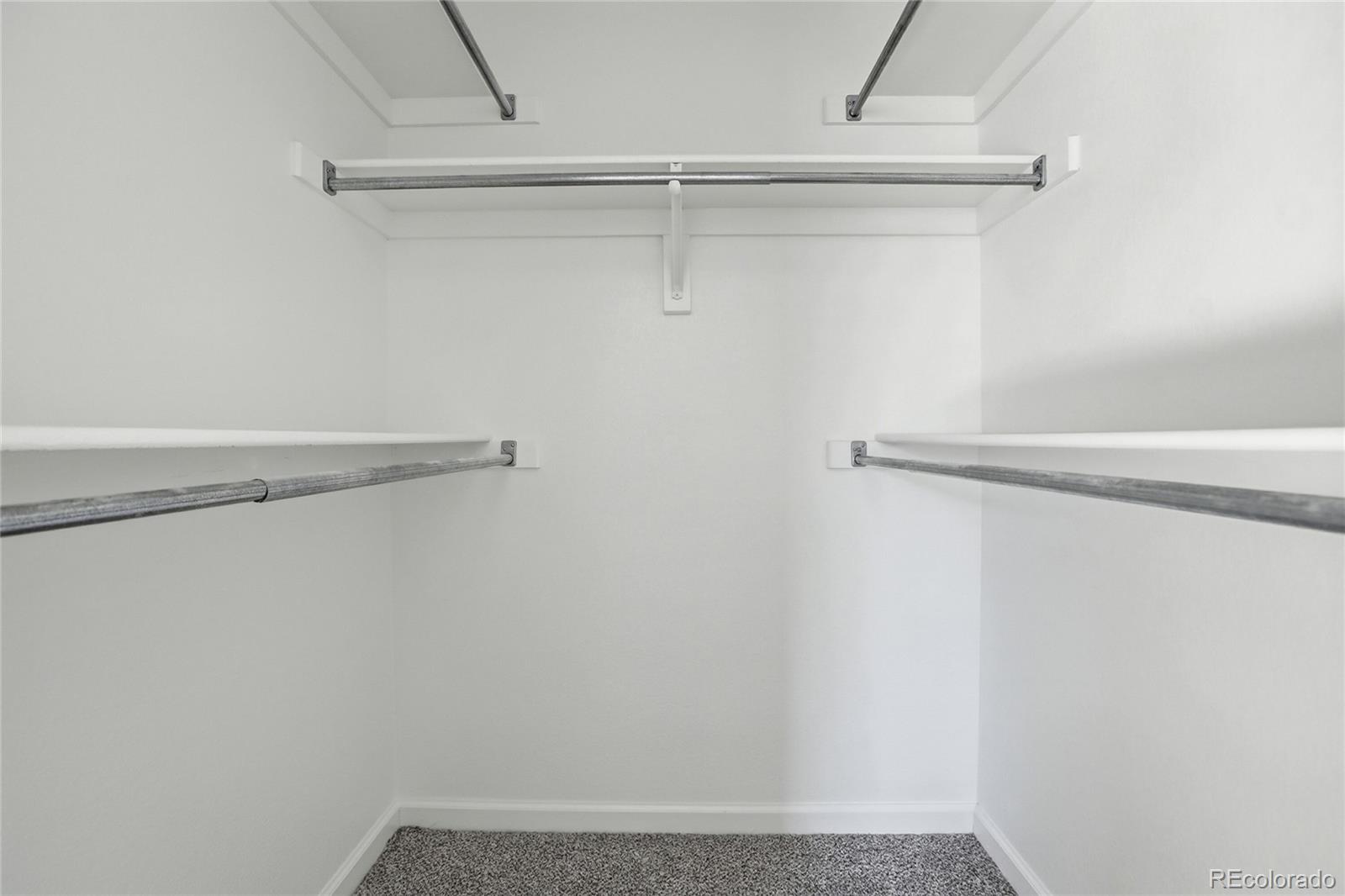 3736 South Inca Street Englewood, CO 80110 - Photo 22 of 31 a view of small space with racks on the wall