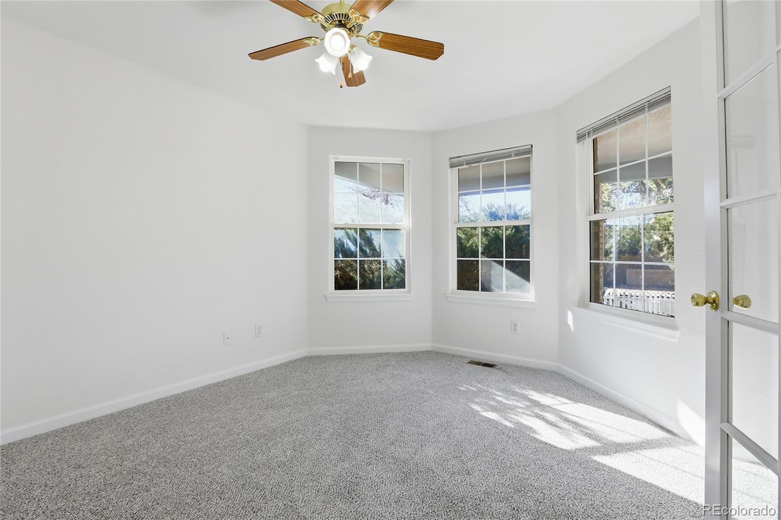 3736 South Inca Street Englewood, CO 80110 - Photo 6 of 31 an empty room with windows