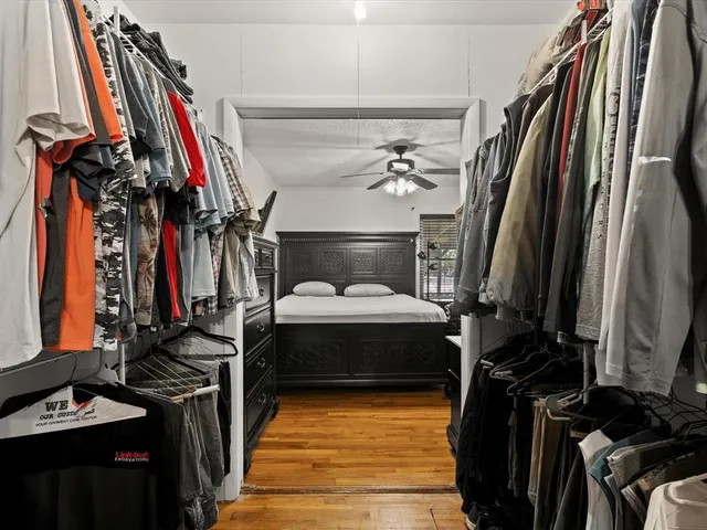 a view of a closet with storage