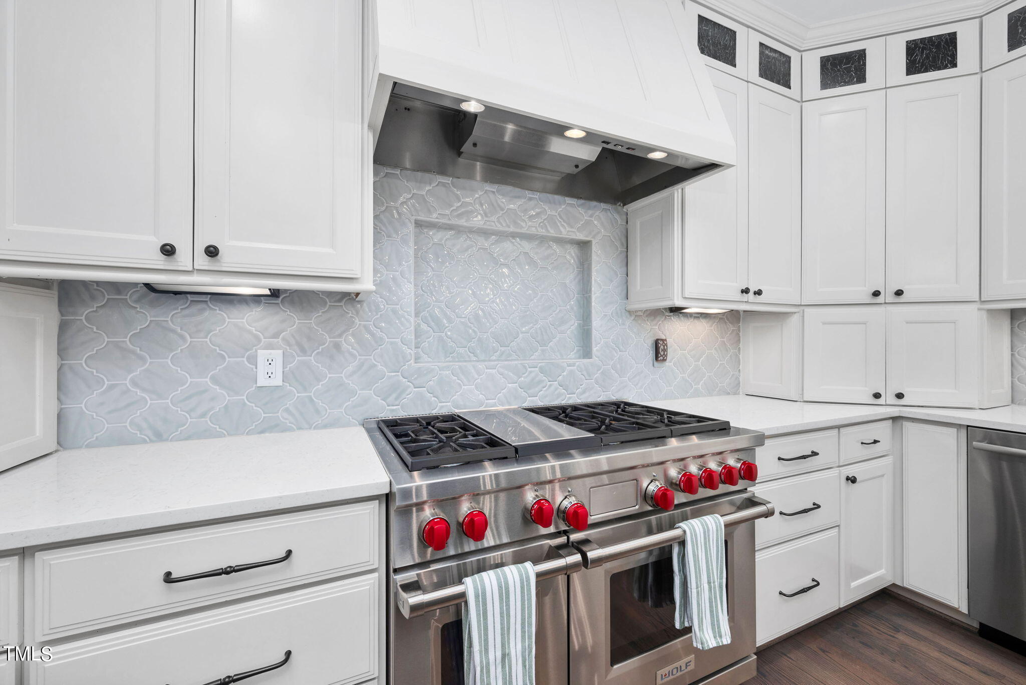 300 Pond Bluff Way Cary, NC 27513 - Photo 11 of 73 a kitchen with granite countertop a sink and cabinets