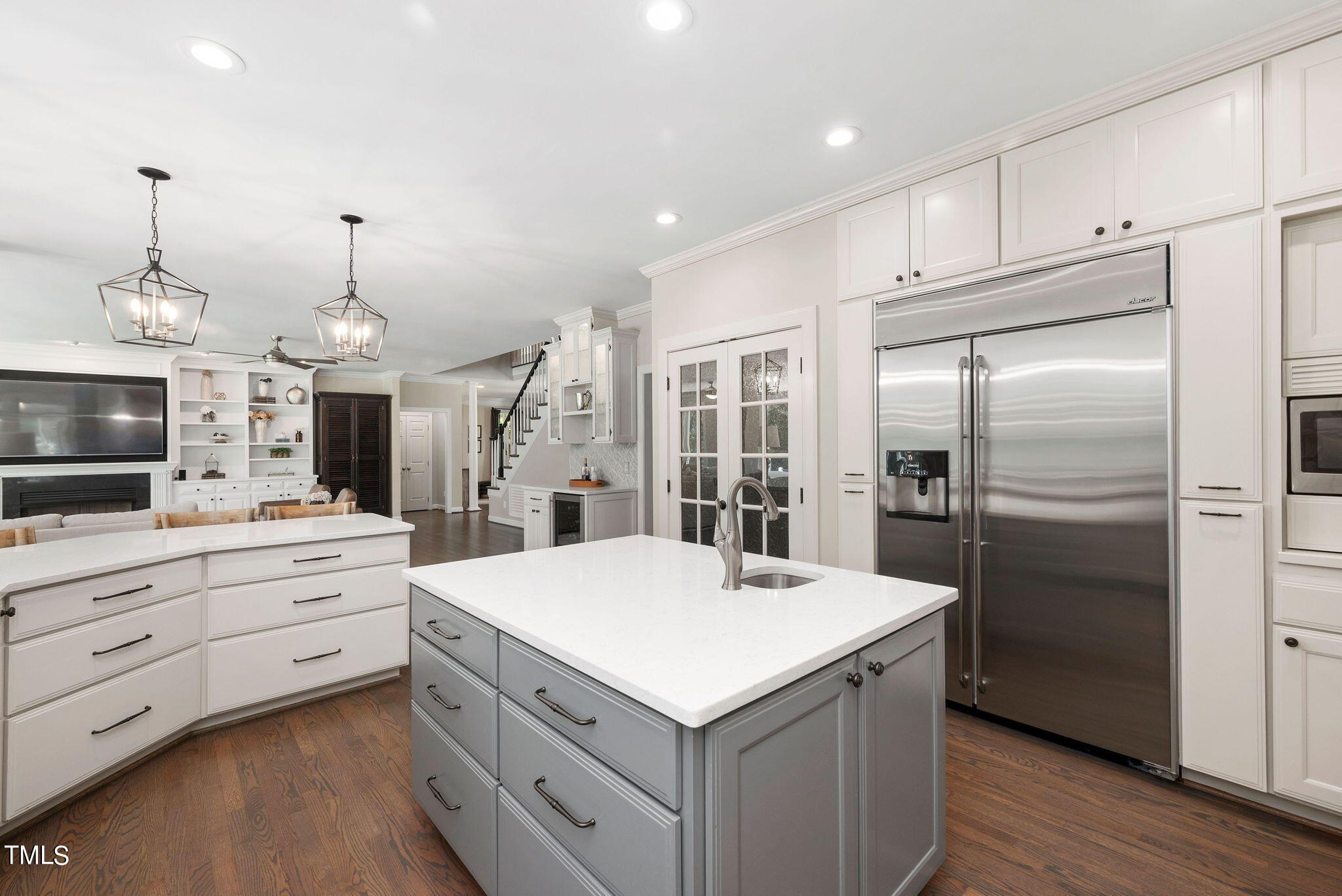 300 Pond Bluff Way Cary, NC 27513 - Photo 12 of 73 a kitchen with a refrigerator and a stove top oven