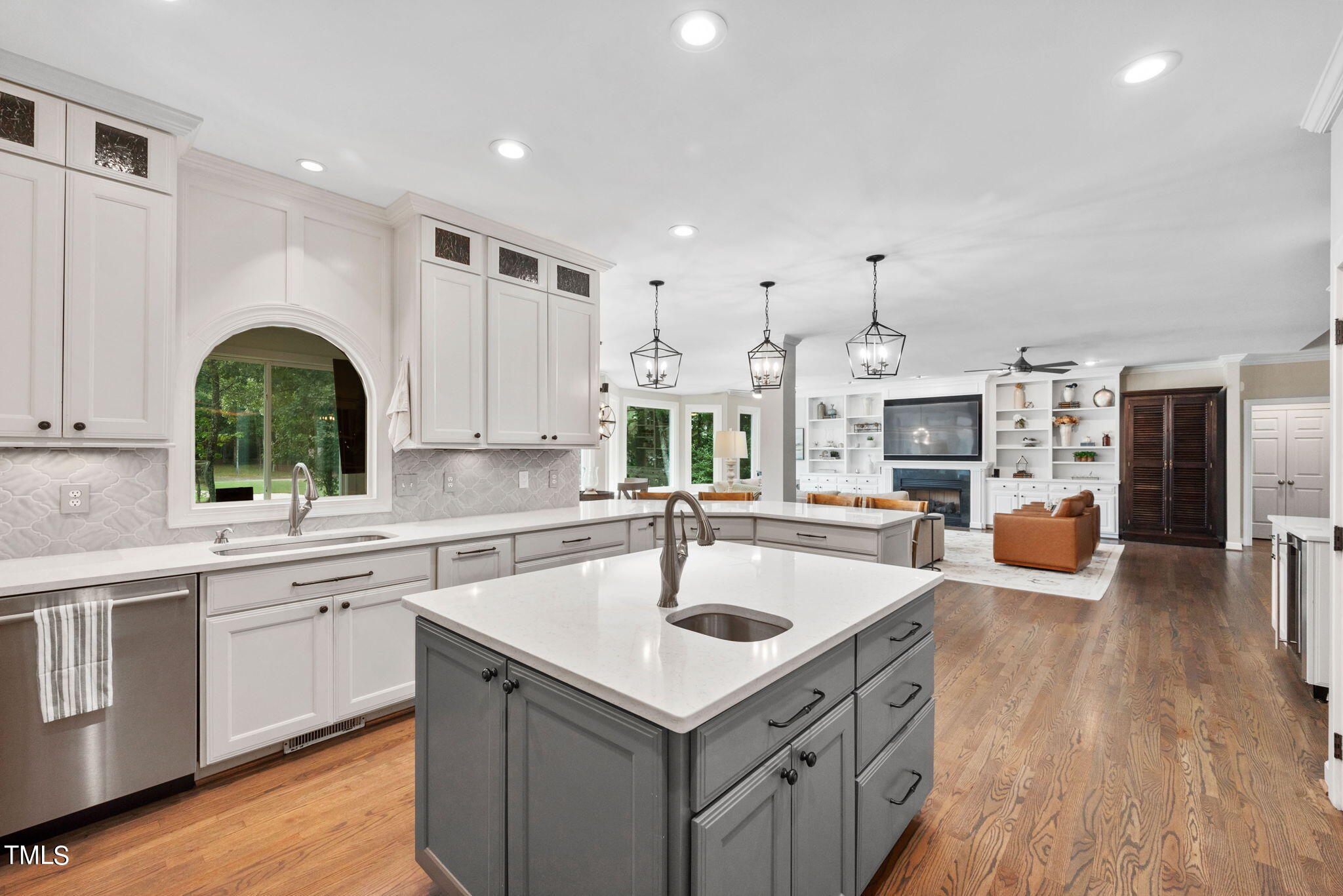 300 Pond Bluff Way Cary, NC 27513 - Photo 13 of 73 a kitchen with stainless steel appliances granite countertop a sink a stove and cabinets