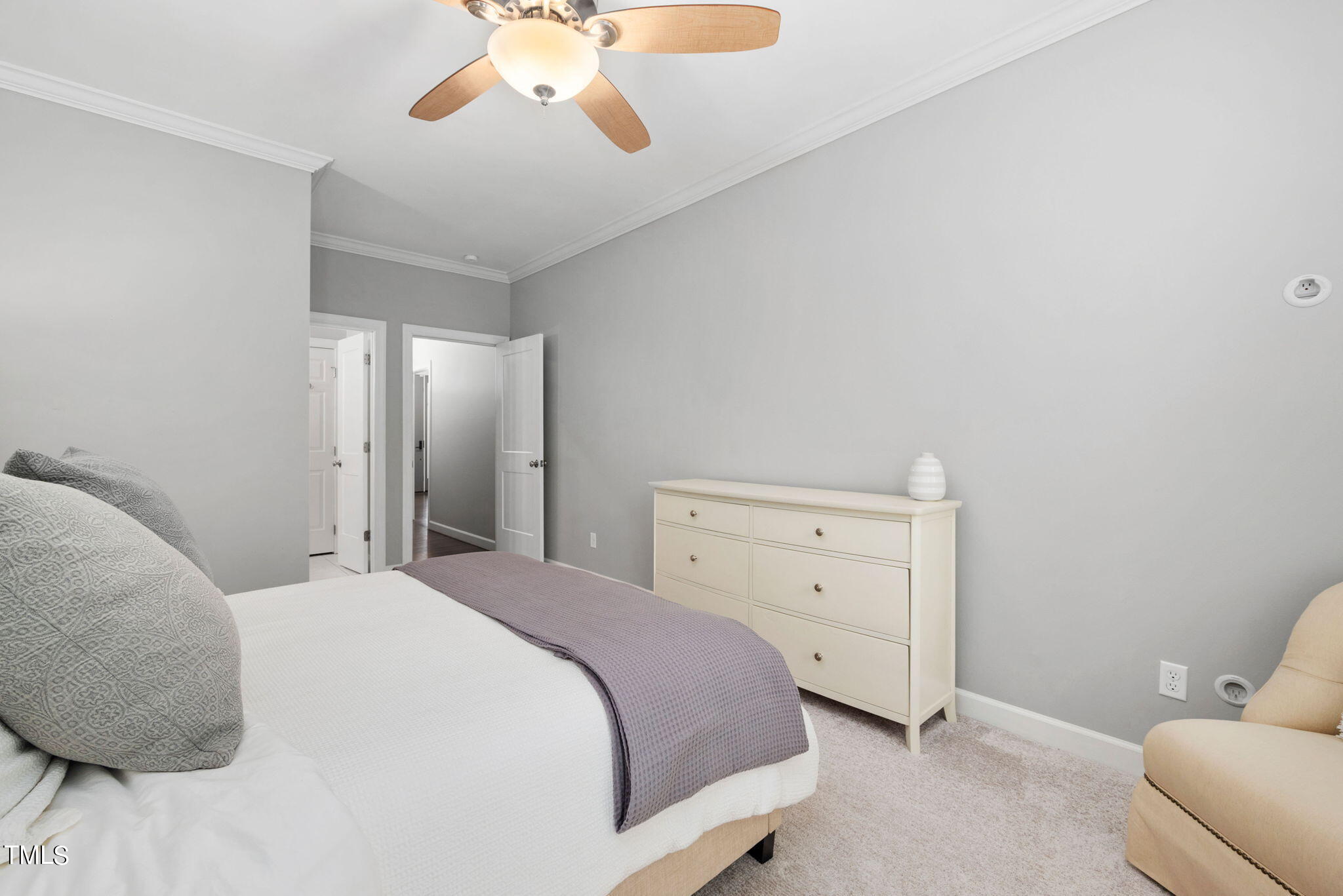 300 Pond Bluff Way Cary, NC 27513 - Photo 17 of 73 a bedroom with a bed and ceiling fan