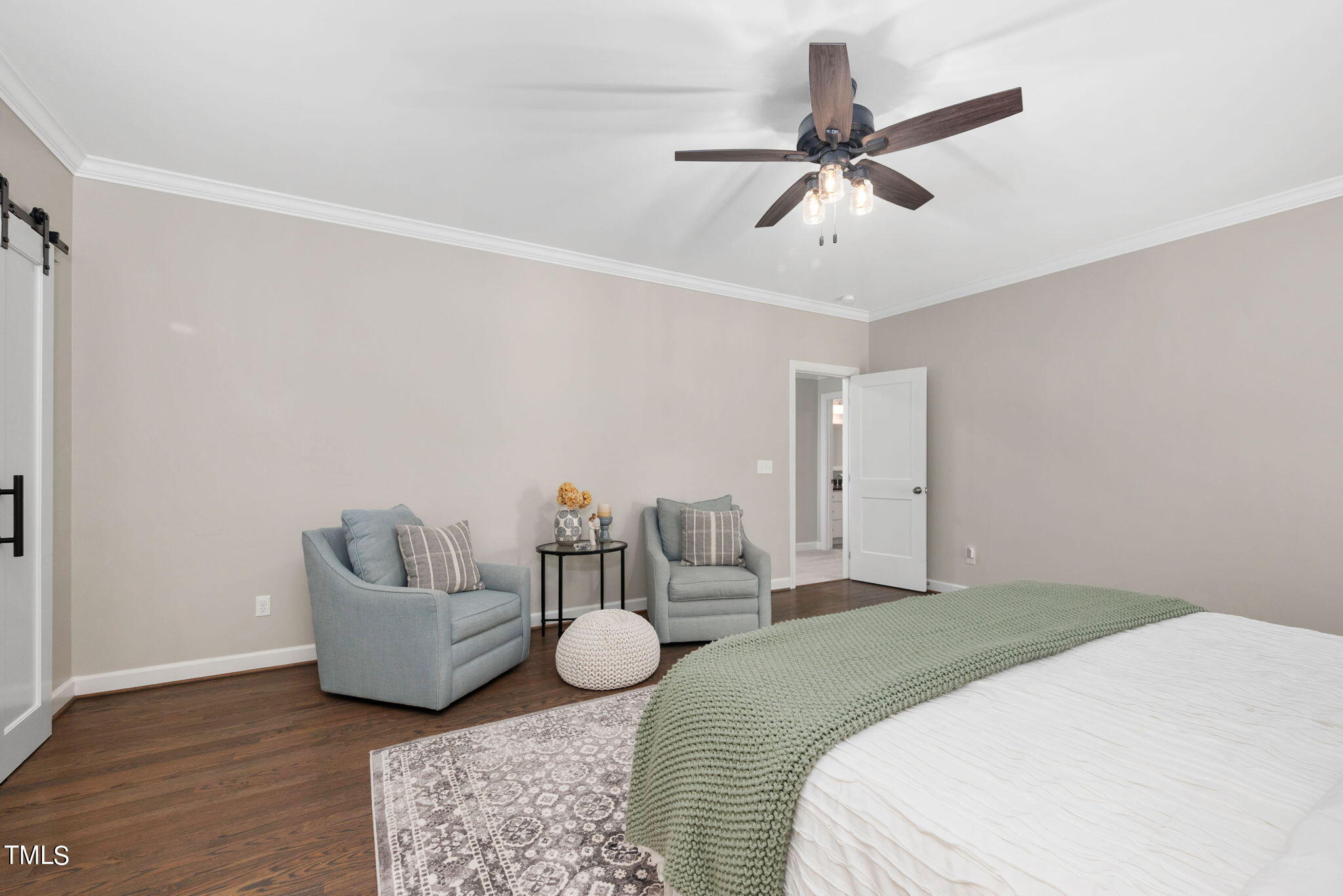 300 Pond Bluff Way Cary, NC 27513 - Photo 24 of 73 a spacious bedroom with a bed and couch