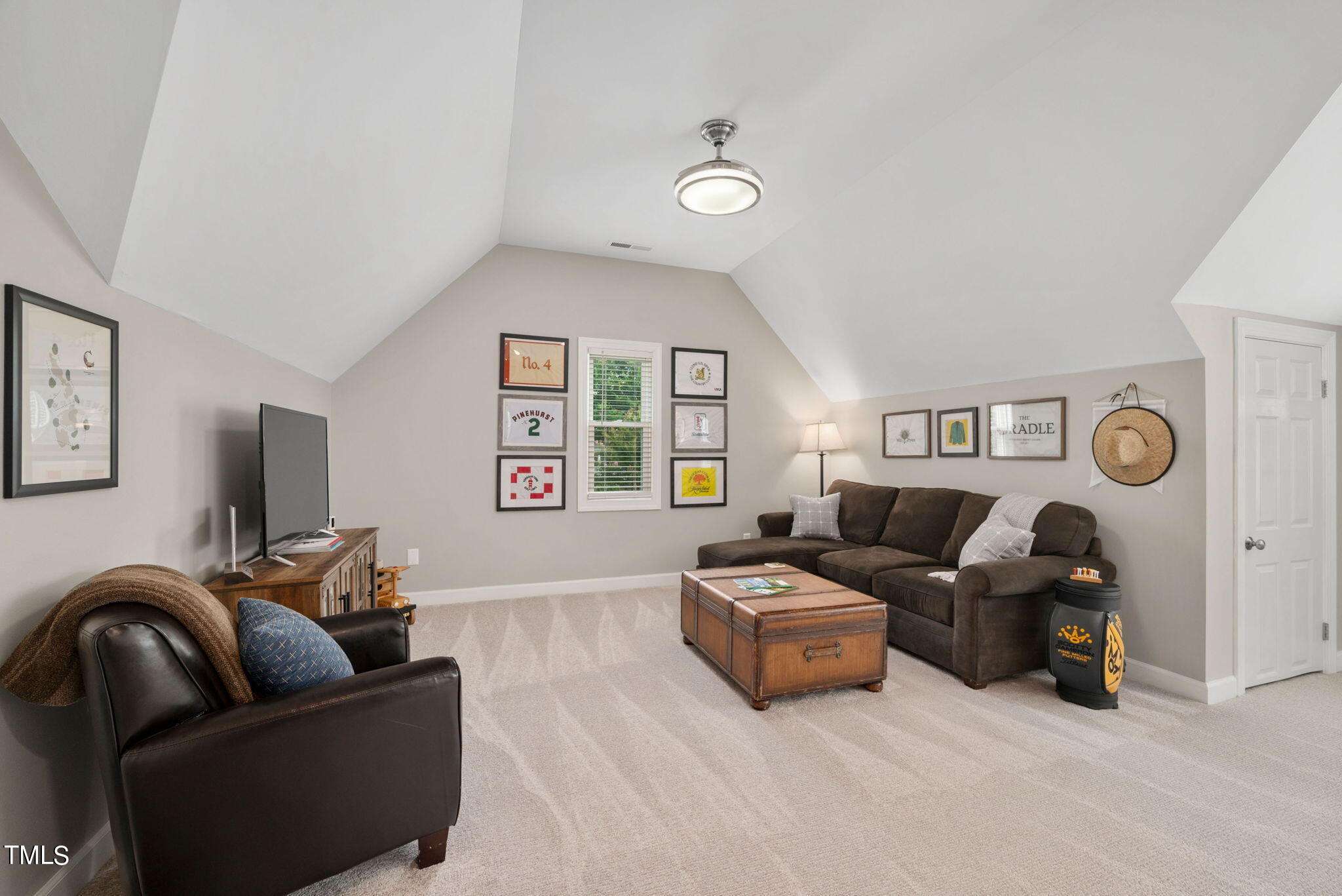 300 Pond Bluff Way Cary, NC 27513 - Photo 35 of 73 a living room with furniture and a couch